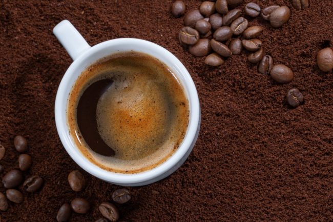 cup-coffee-ground-coffee-closeup-compressed