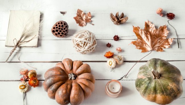 Autumn background with different objects and pumpkin. Flat-lay.